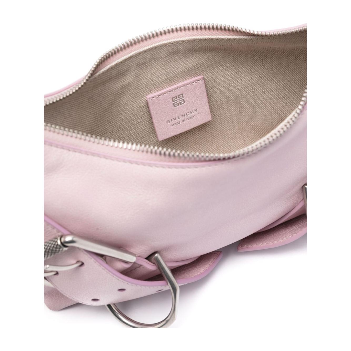 Front view with bag zipped and handles upright.