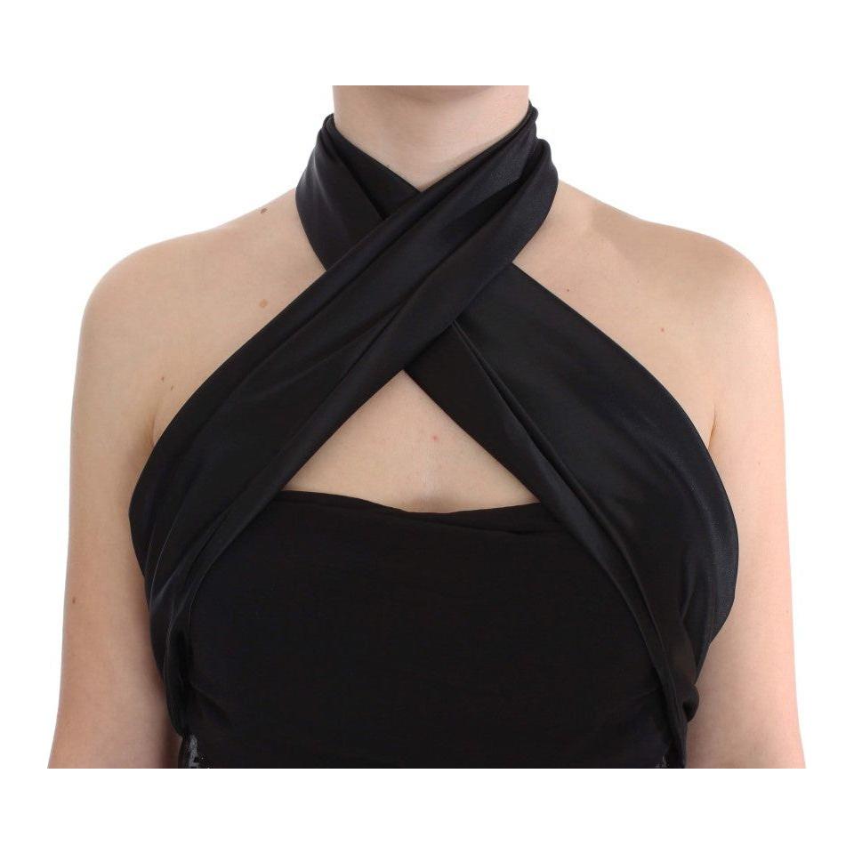 بلوزة سهرة أنيقة باللون الأسود من إكستي