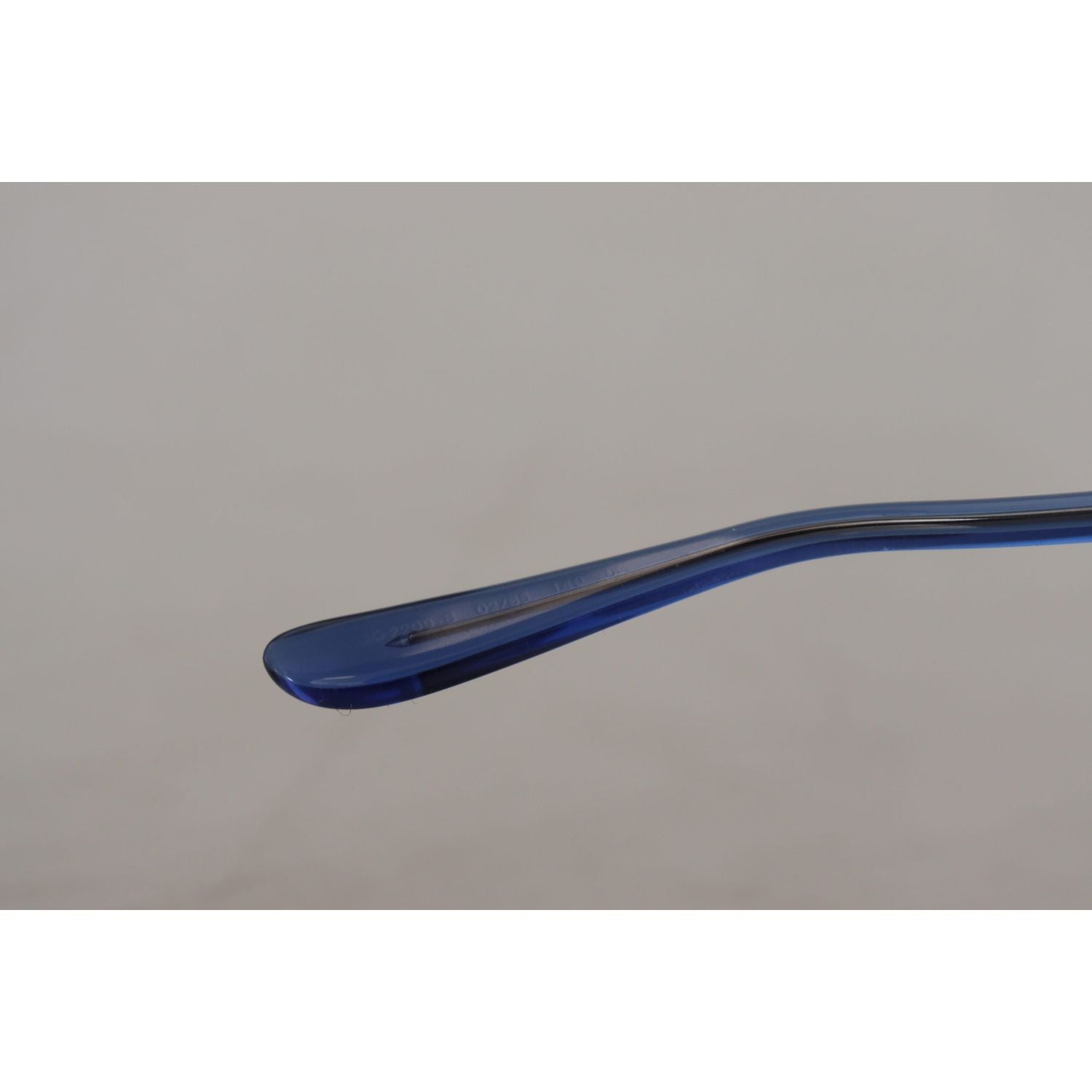 نظارة شمسية دولتشي آند غابانا بيضاوية ذهبية مزينة بالكريستال